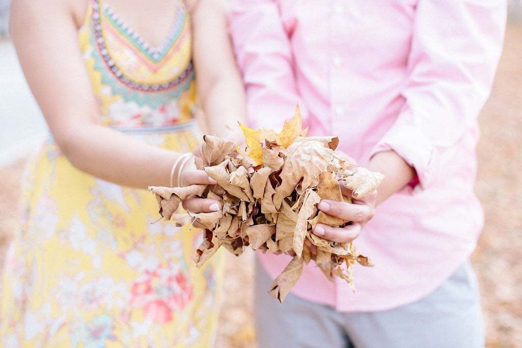 Fine Art Wedding Photography - Lauren Renee Photography Bride and groom holding leaves in their hands
