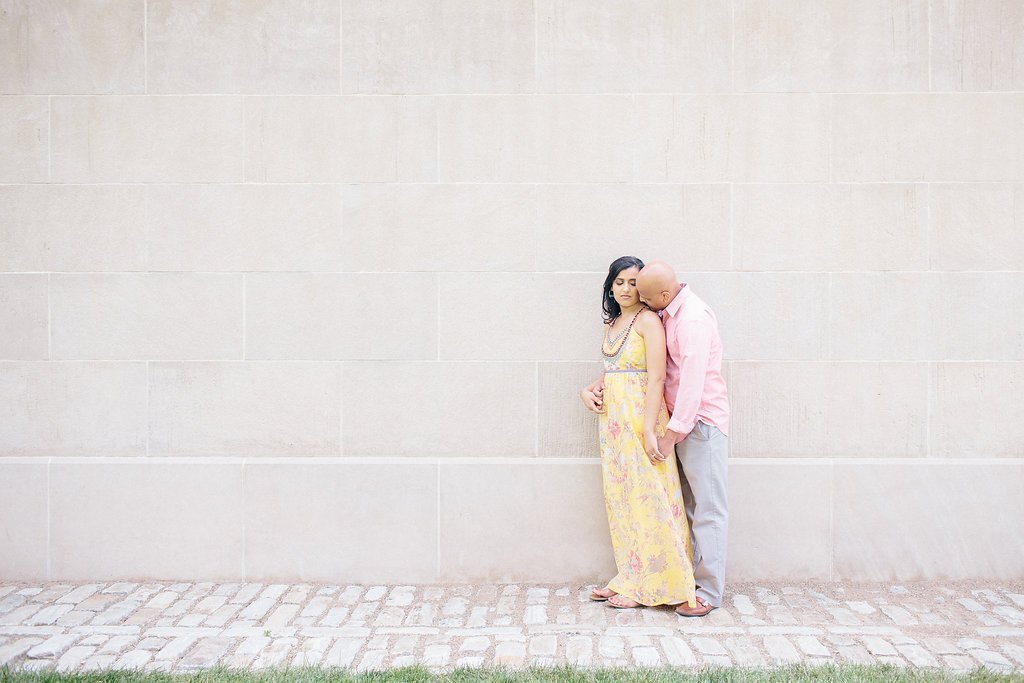Fine Art Wedding Photography - Lauren Renee Photography Bride and groom posing against and white stone wall