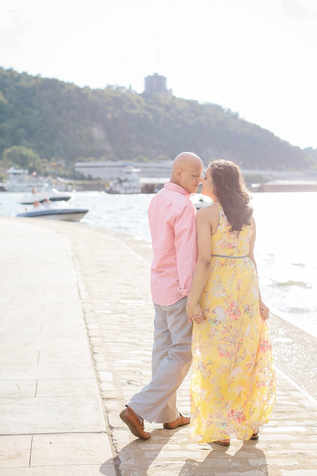 Fine Art Wedding Photography - Lauren Renee Photography Bride and groom walking along the riverwalk