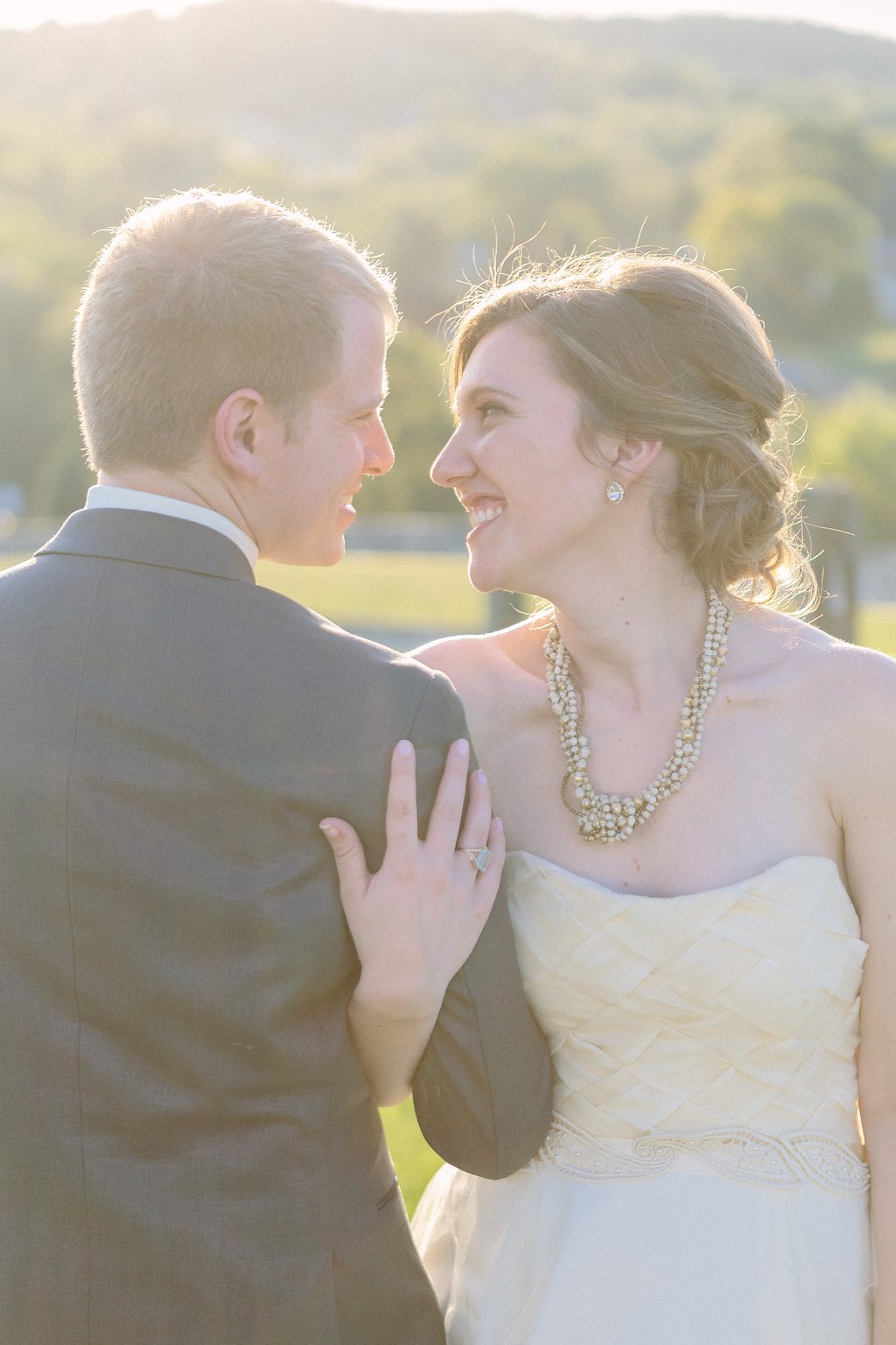 Fine Art Wedding Photography, Pittsburgh Wedding Photography, Lauren Renee Photography bride and groom kissing is a field
