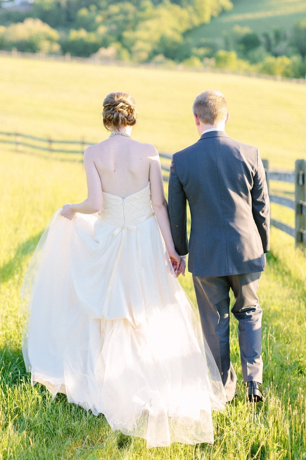 Fine Art Wedding Photography, Pittsburgh Wedding Photography, Lauren Renee Photography bride and groom walking through a field on the farm