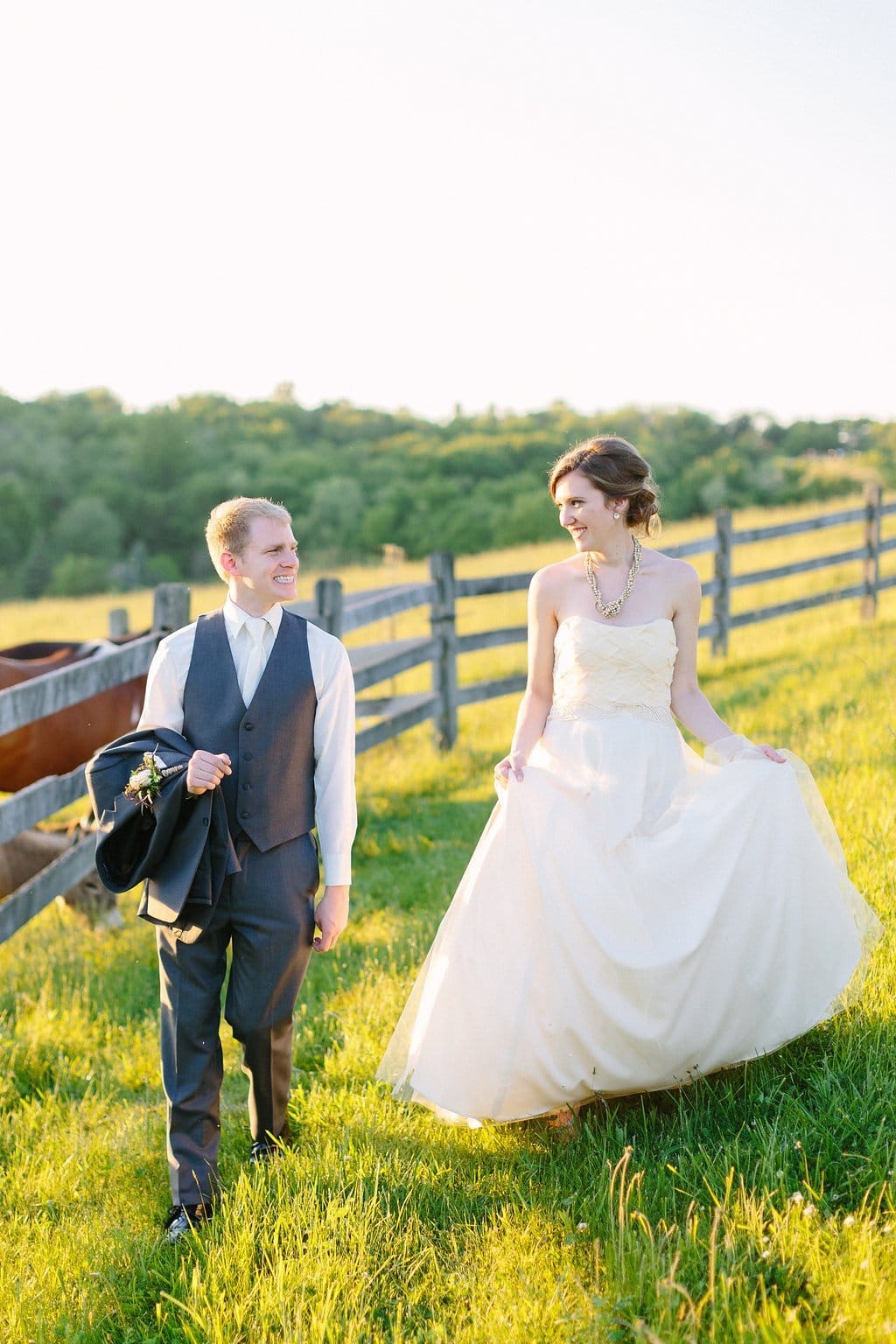 Fine Art Wedding Photography, Pittsburgh Wedding Photography, Lauren Renee Photography Bride and groom walking through a field with a farm horse