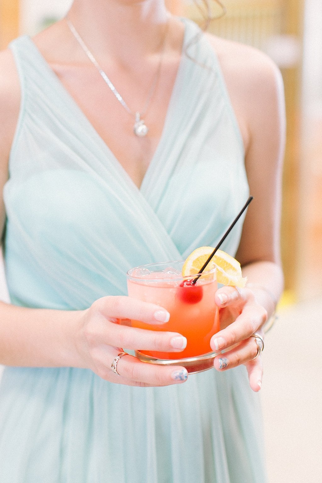 Fine Art Wedding Photography, Pittsburgh Wedding Photography, Lauren Renee Photography bridesmaid holding signature cocktail at cocktail hour