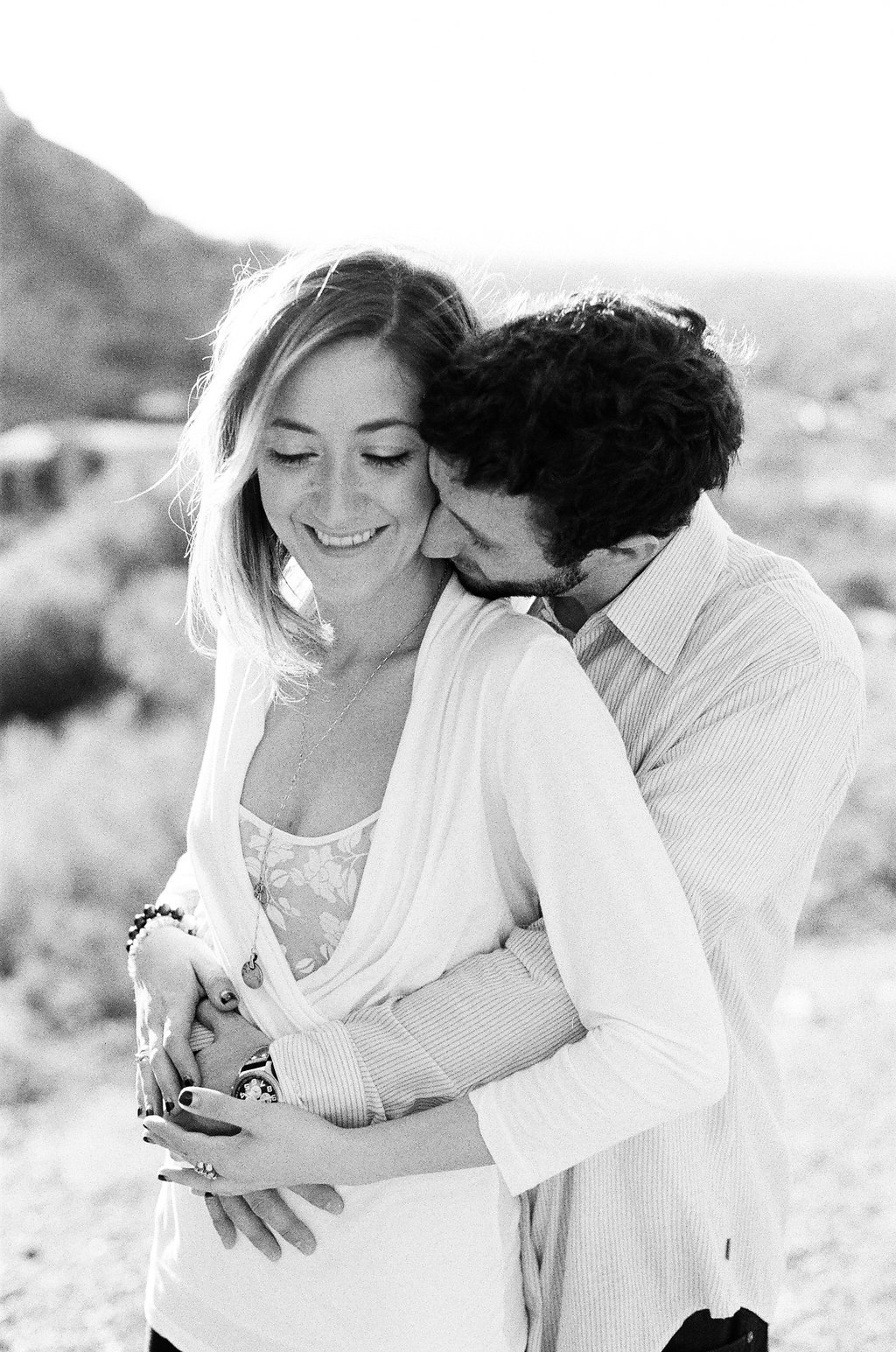 Shelby & Ethan, Arizona Engagement Session, Travel and Destination, Lauren Renee Photography black and white photo of couple embracing on camel back mountain