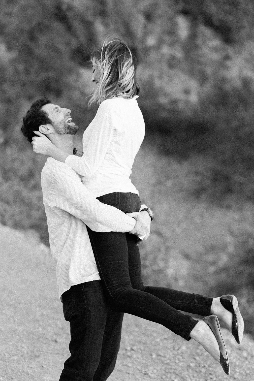 Shelby & Ethan, Arizona Engagement Session, Travel and Destination, Lauren Renee Photography Black and white photo of groom lifting his bride in the air by the waist