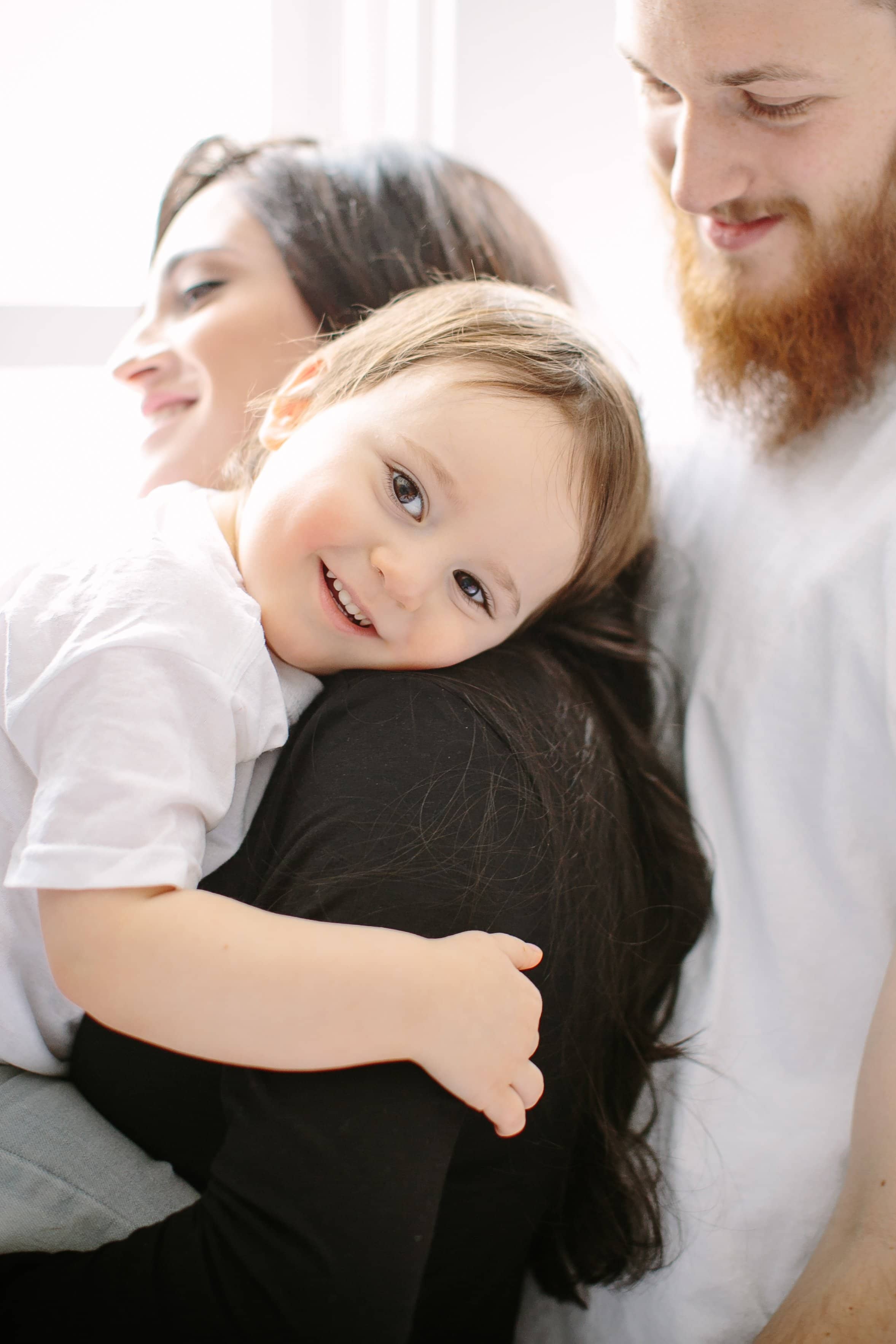 Maternity and Family Session, Fine Art Photography - Lauren Renee Photography toddler being embraced by parents during photo session