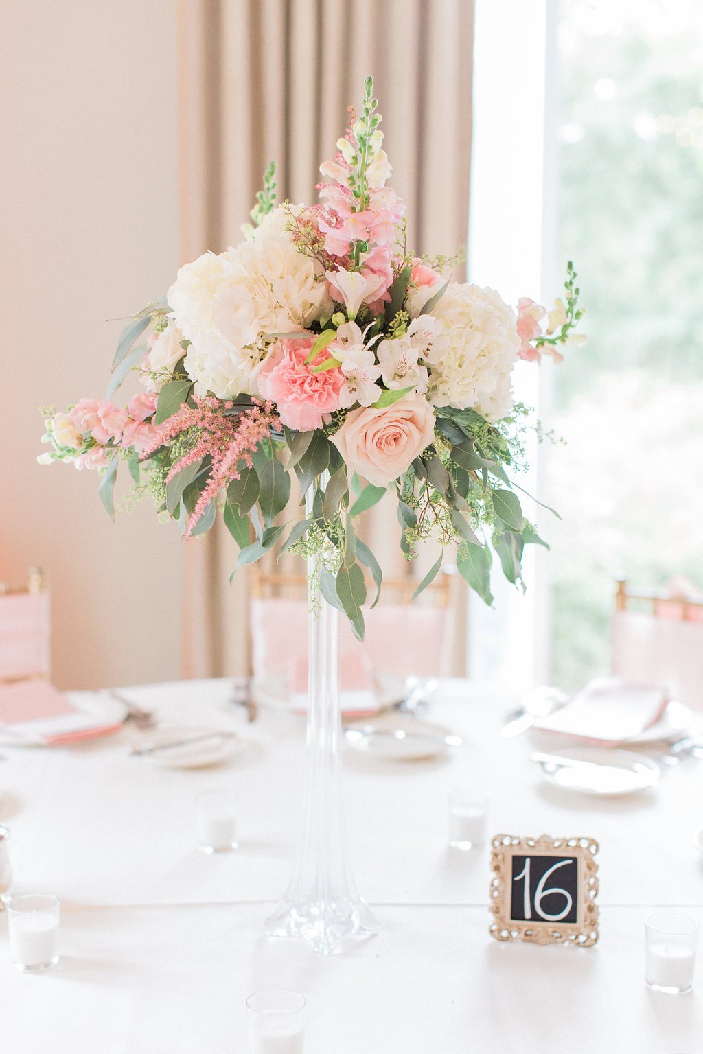 Lauren Renee Photography Pink floral tall center pieces