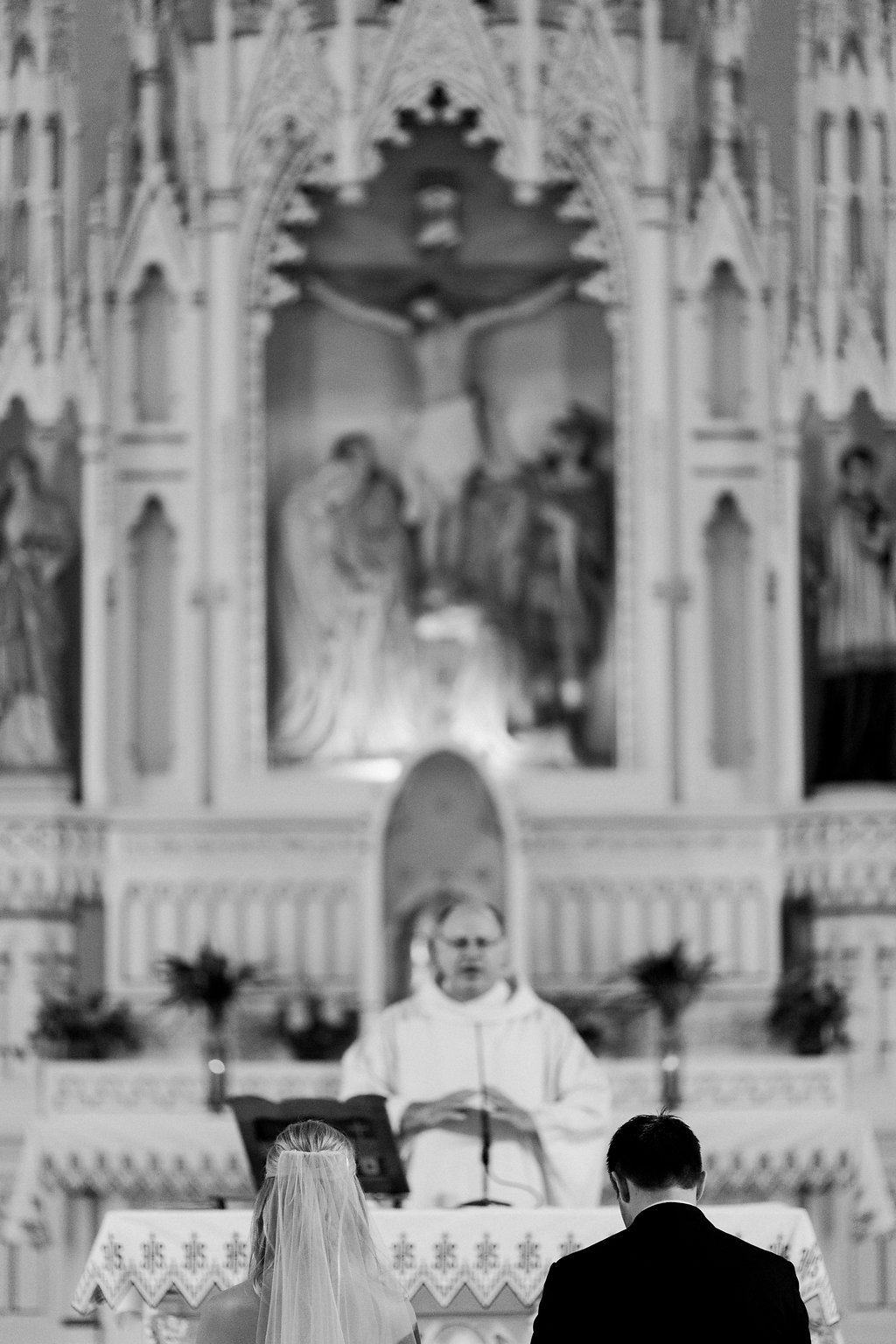 Lauren Renee Photography Bride and groom at the altar