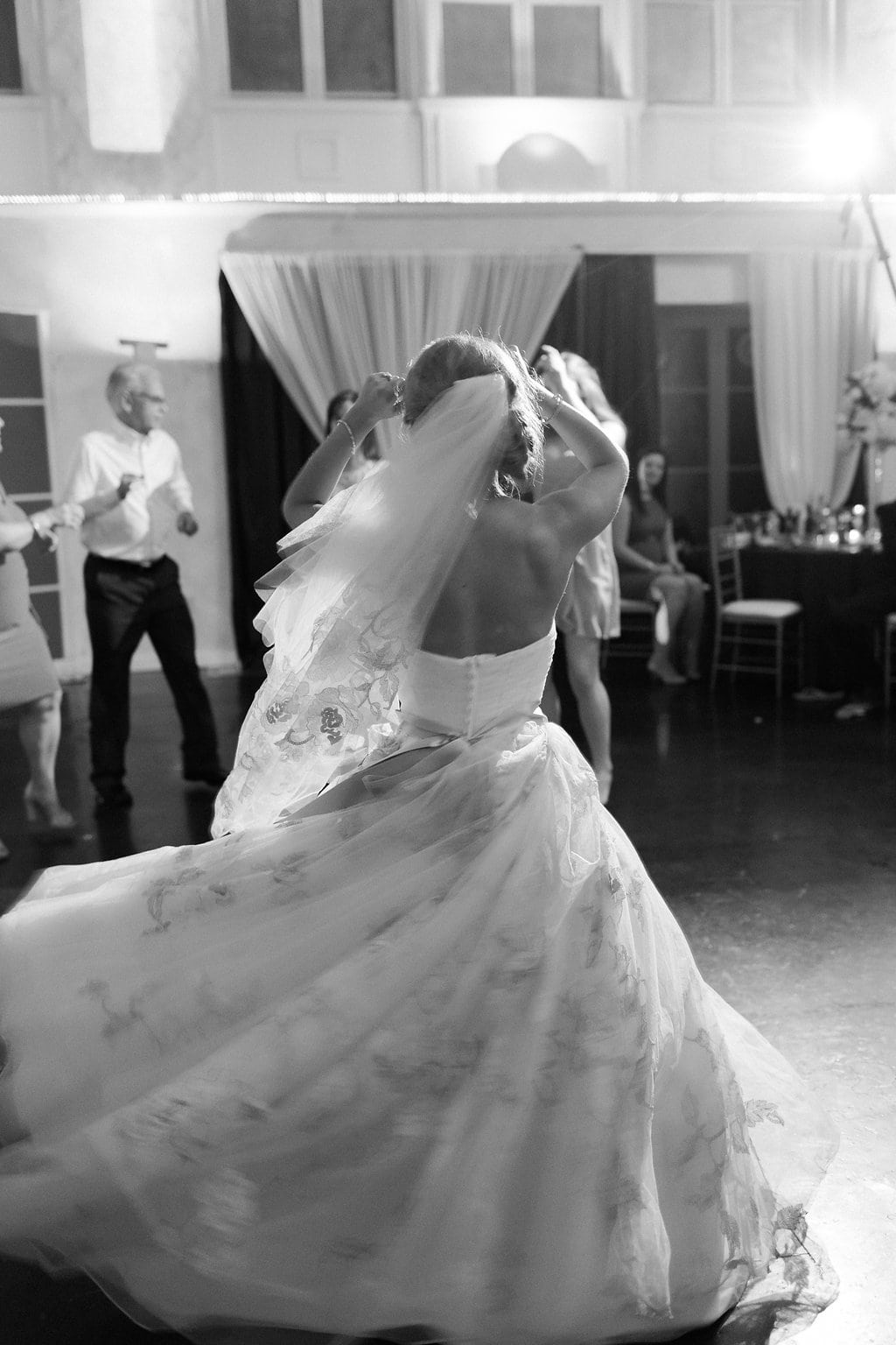 Destination Wedding Photography, Lauren Renee Photography Bride dancing with guests on the dance floor