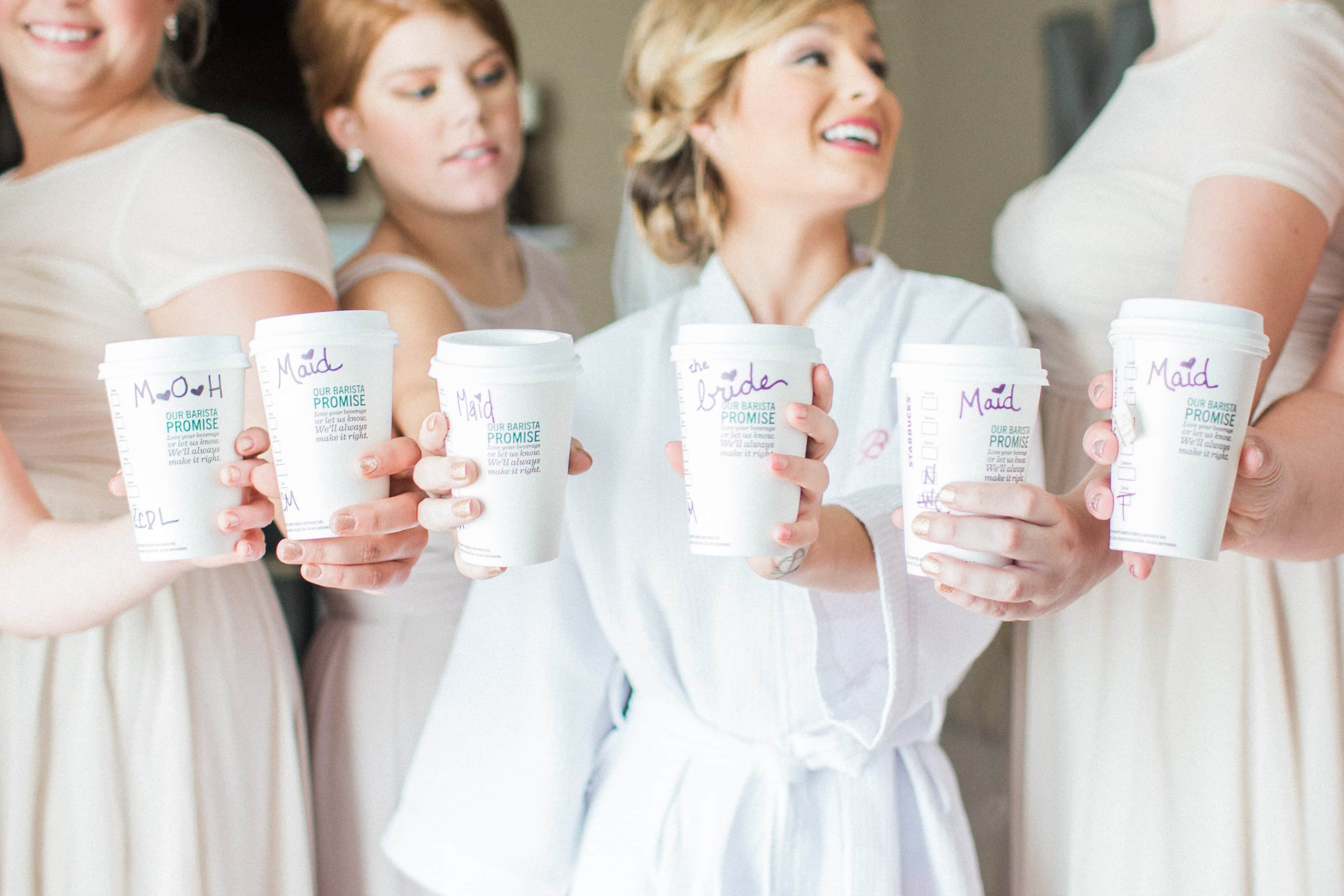 Destination Wedding Photography, Lauren Renee Photography Starbucks coffee cups with bride and bridesmaids