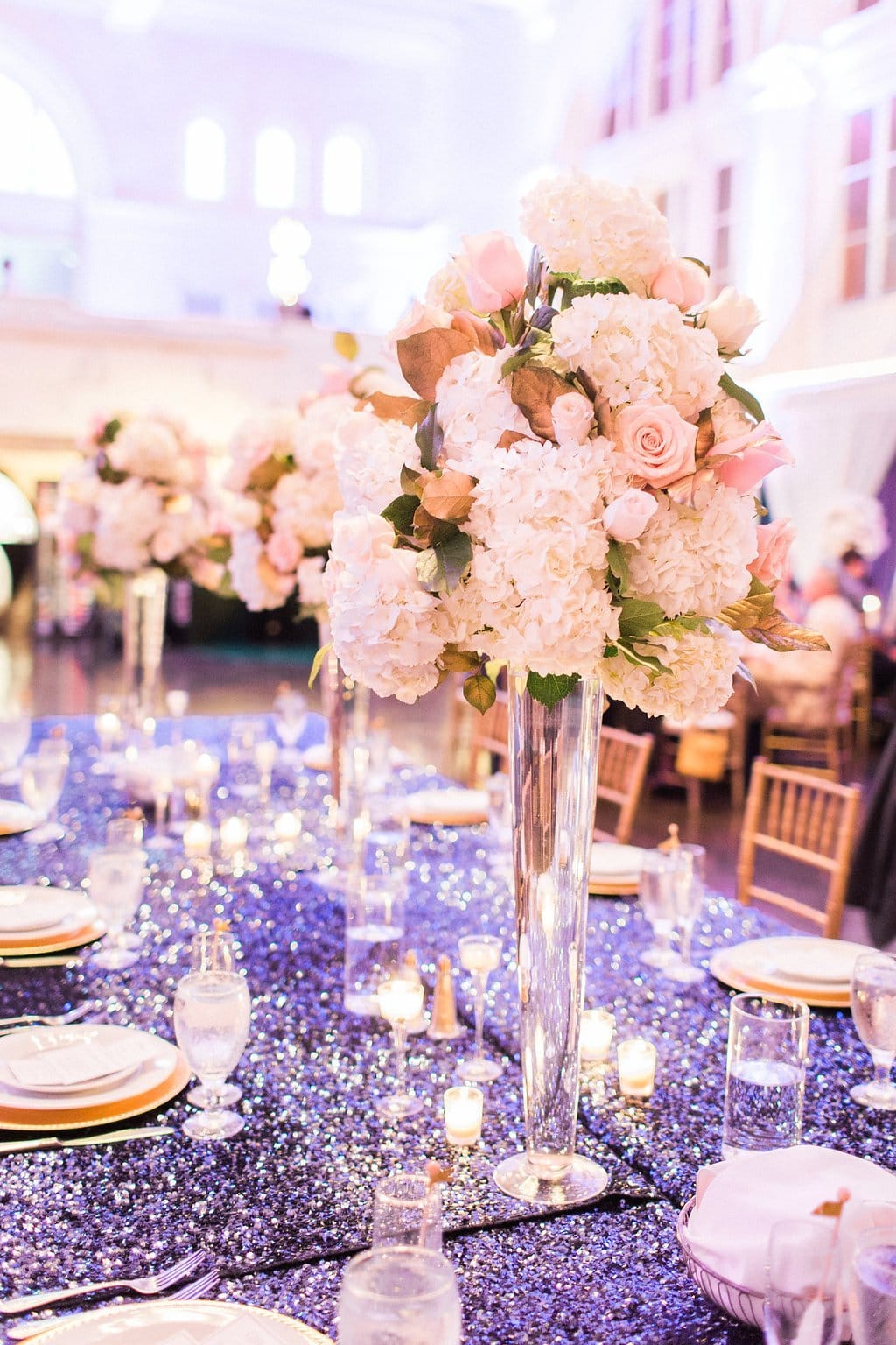 Destination Wedding Photography, Lauren Renee Photography Table decor with tall center floral center pieces