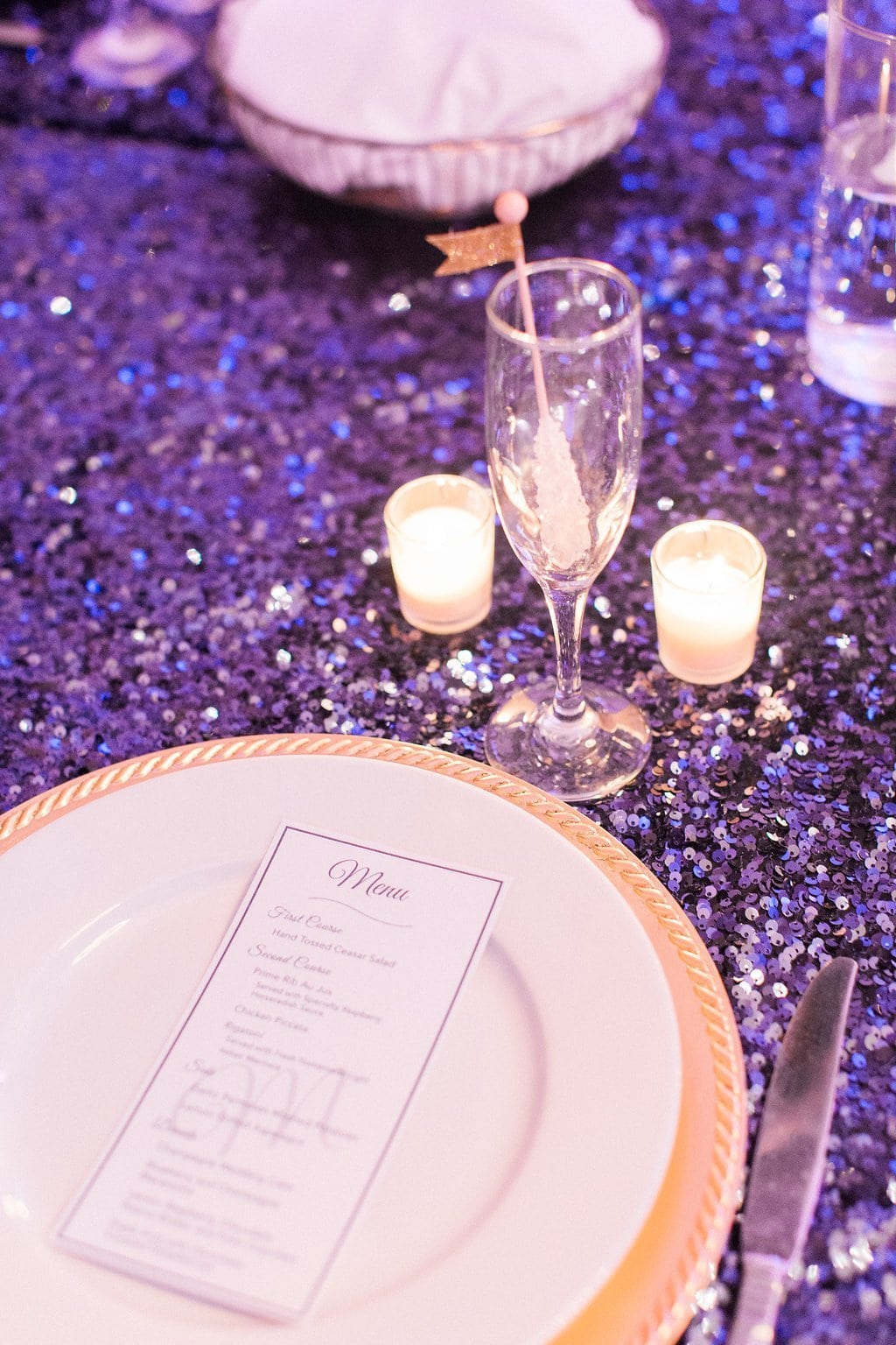 Destination Wedding Photography, Lauren Renee Photography Table setting with blue sequence table cloth and gold plates
