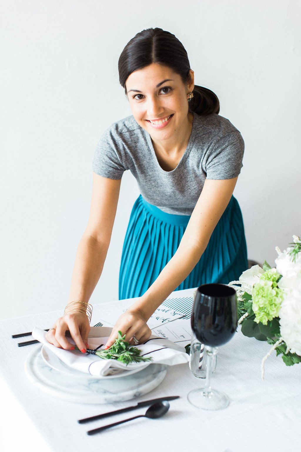 Published on SMP - Lauren Renee Photography The event group putting finishing touches on the table display