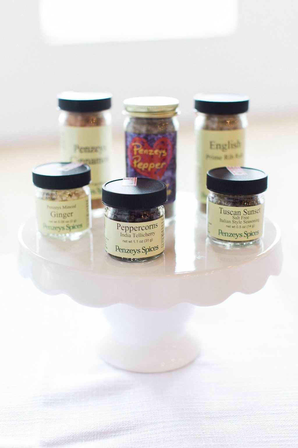 Published on SMP - Lauren Renee Photography penzeys spieces on a white cake display
