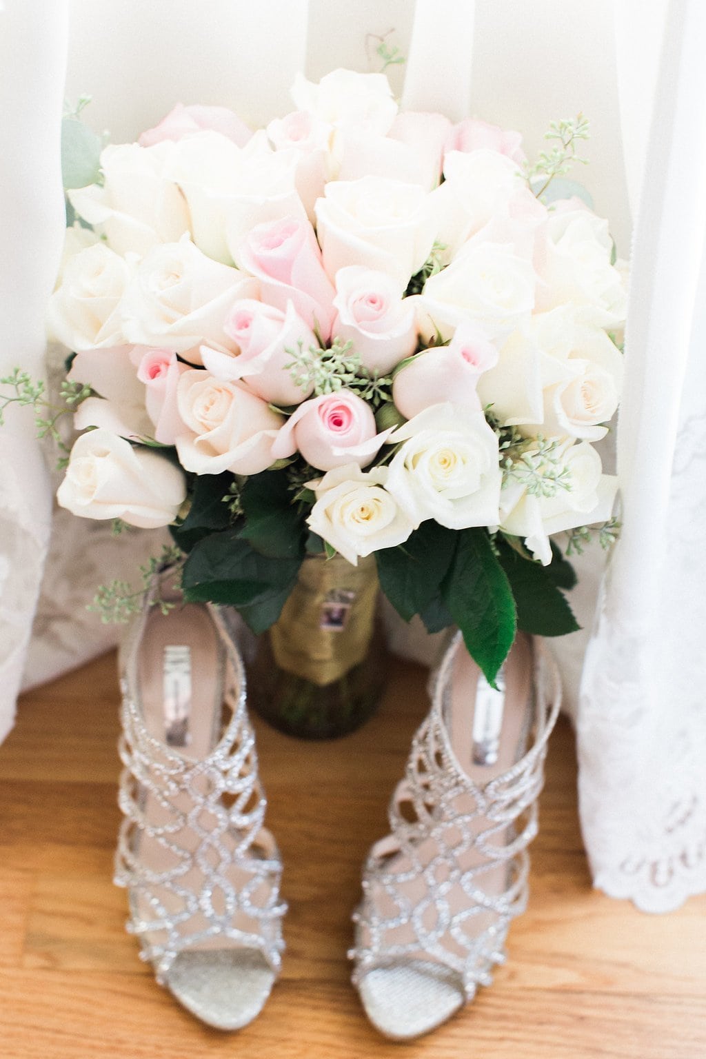 Lauren Renee - Pittsburgh Fine Art Wedding Photography Bride's pink and white bouquet with shoes and wedding dress