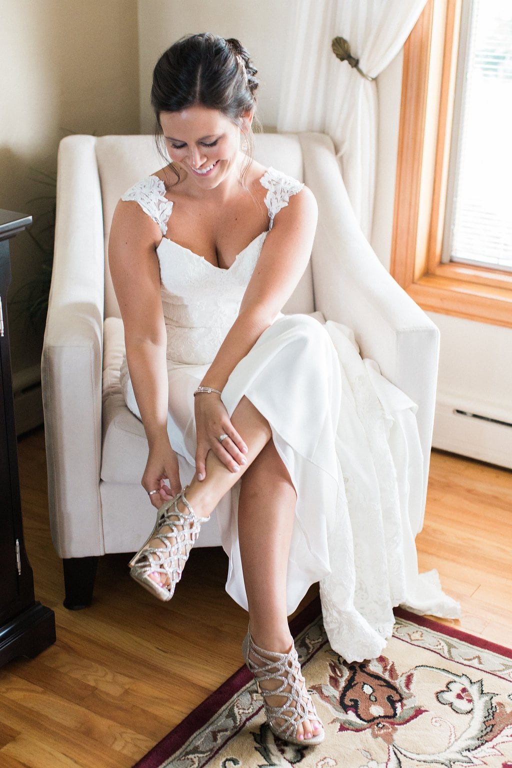 Lauren Renee - Pittsburgh Fine Art Wedding Photography Bride putting on her shoes