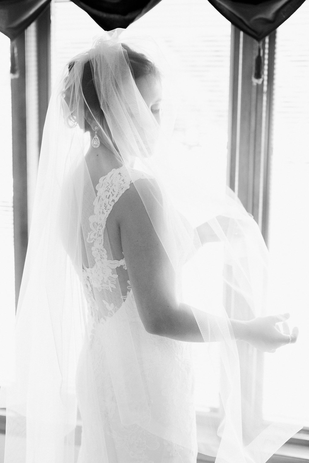 Lauren Renee - Pittsburgh Fine Art Wedding Photography Black and white photo of bride wearing her veil