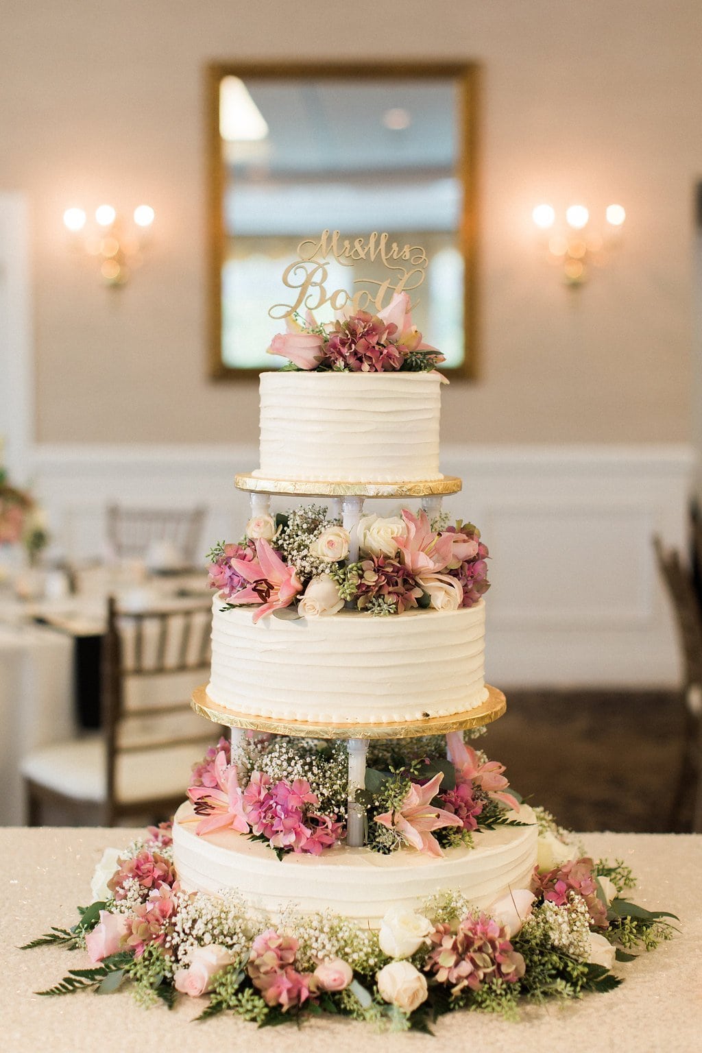 Lauren Renee - Pittsburgh Fine Art Wedding Photography Three tied wedding cake with pink flowers and laser cutout topper
