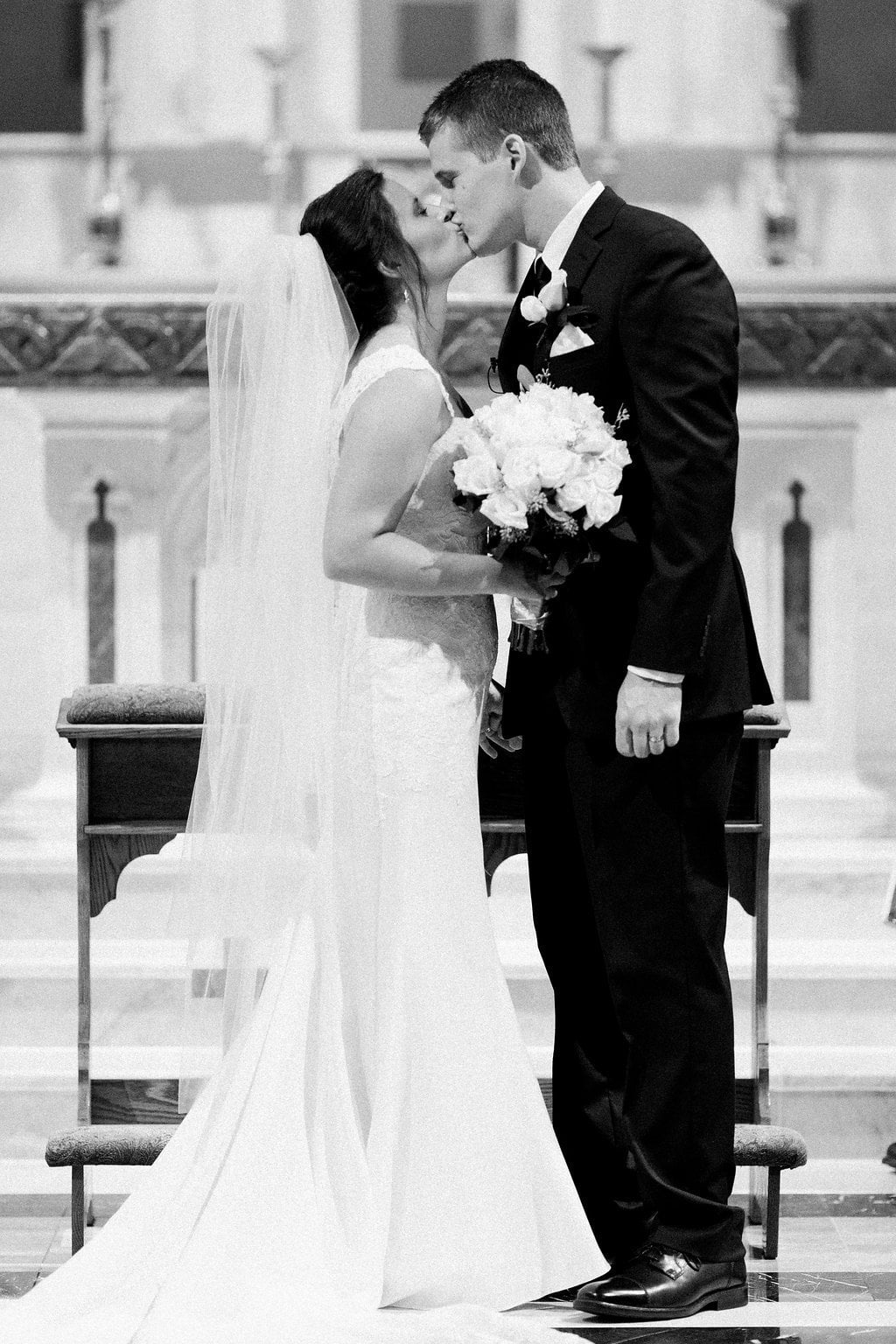 Lauren Renee - Pittsburgh Fine Art Wedding Photography Black and white photo of first kiss as husband and wife