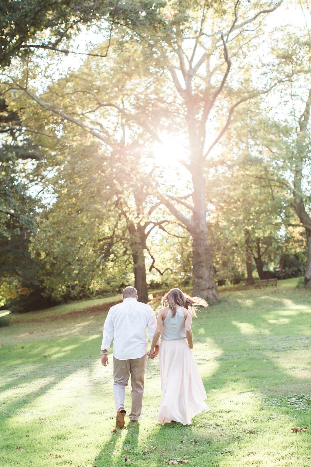 Lauren Renee - Pittsburgh Wedding Photography Couple walking together away from the camera holding hands