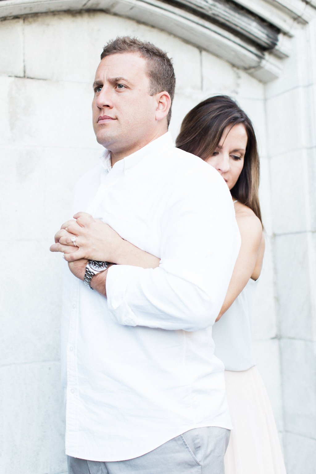 Lauren Renee - Pittsburgh Wedding Photography Groom looking off into the distance while bride embraces him from behind