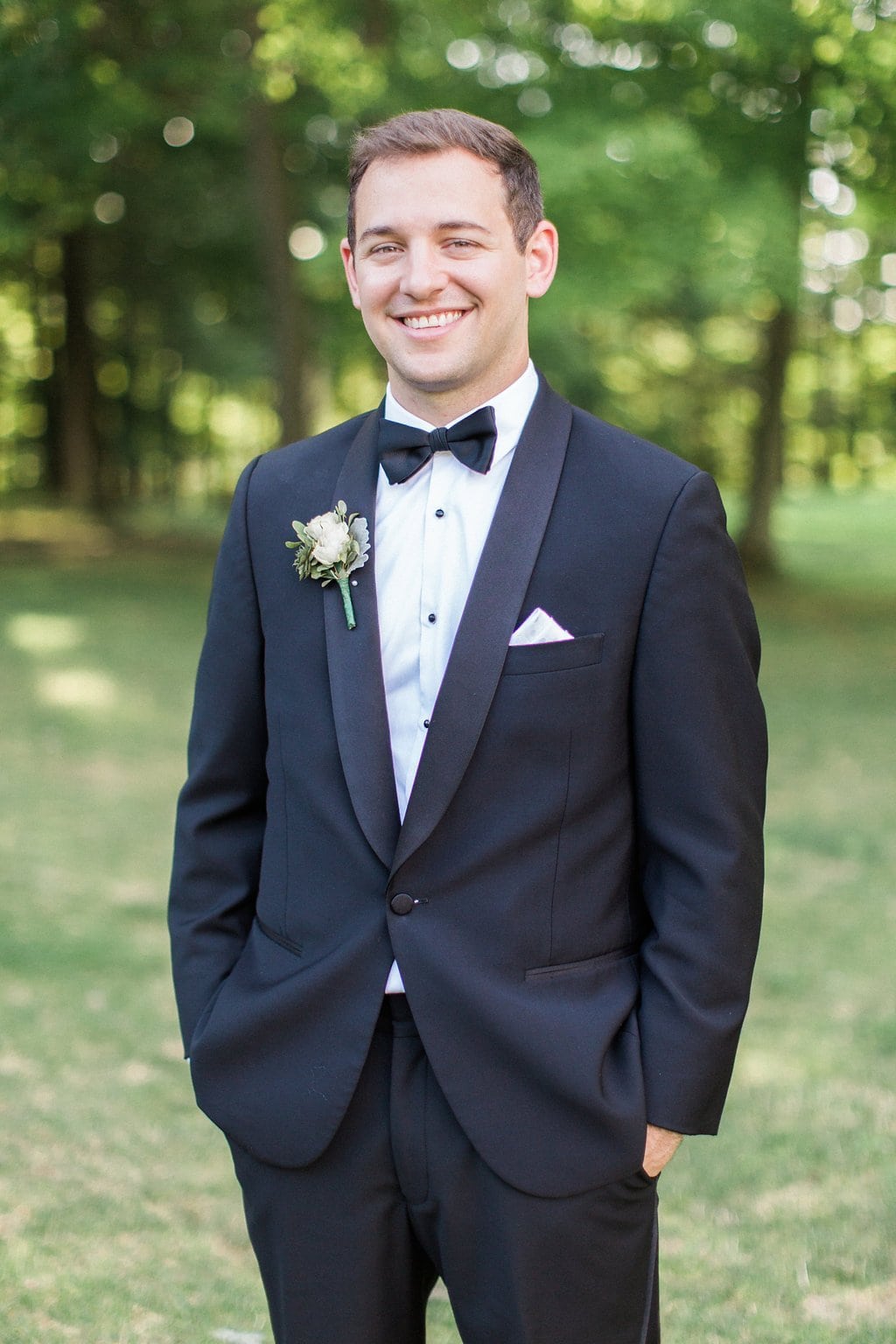 Golf Club Wedding - Lauren Renee Photography portrait of groom wearing a tux on his wedding day