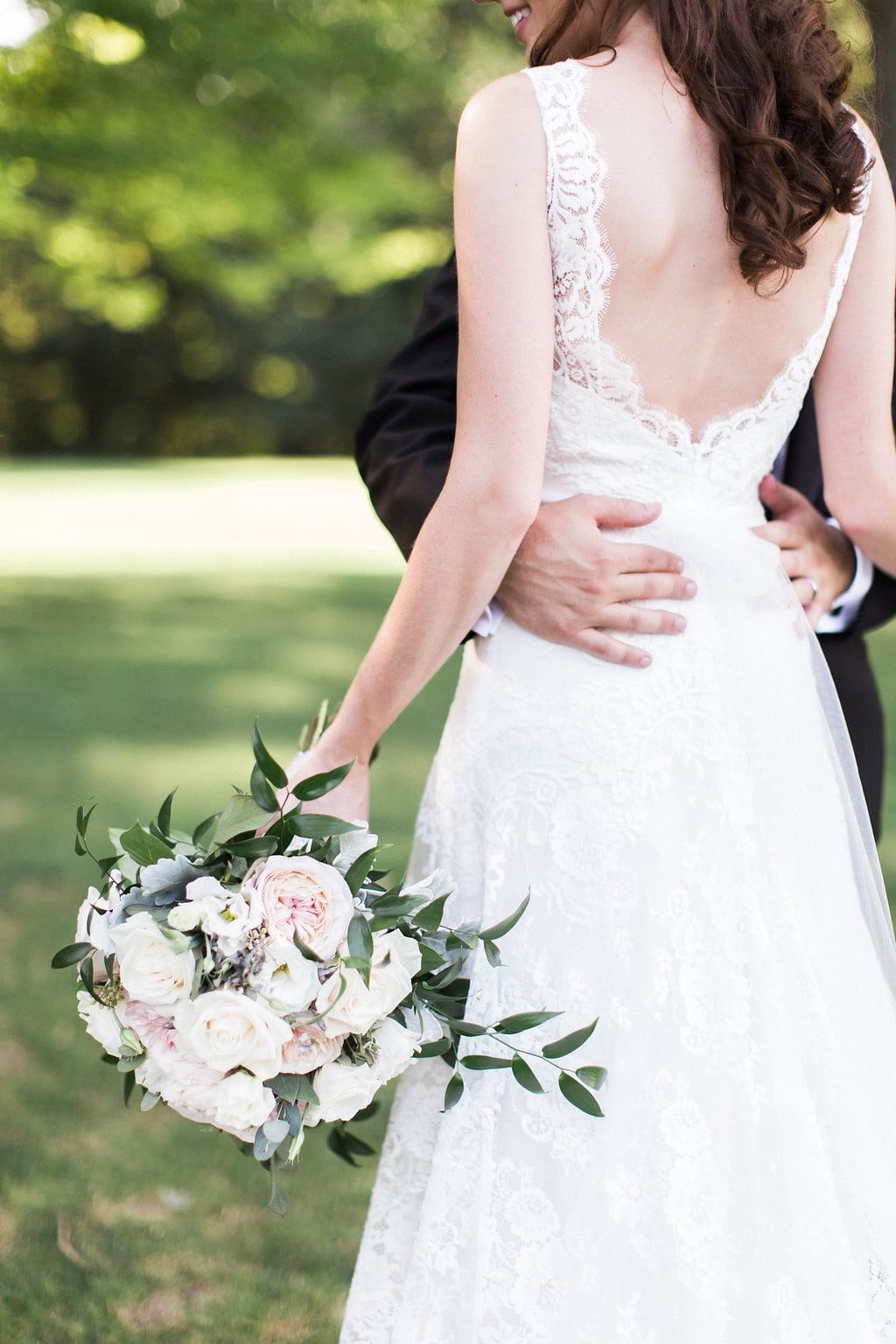 Golf Club Wedding - Lauren Renee Photography back of bride's wedding dress
