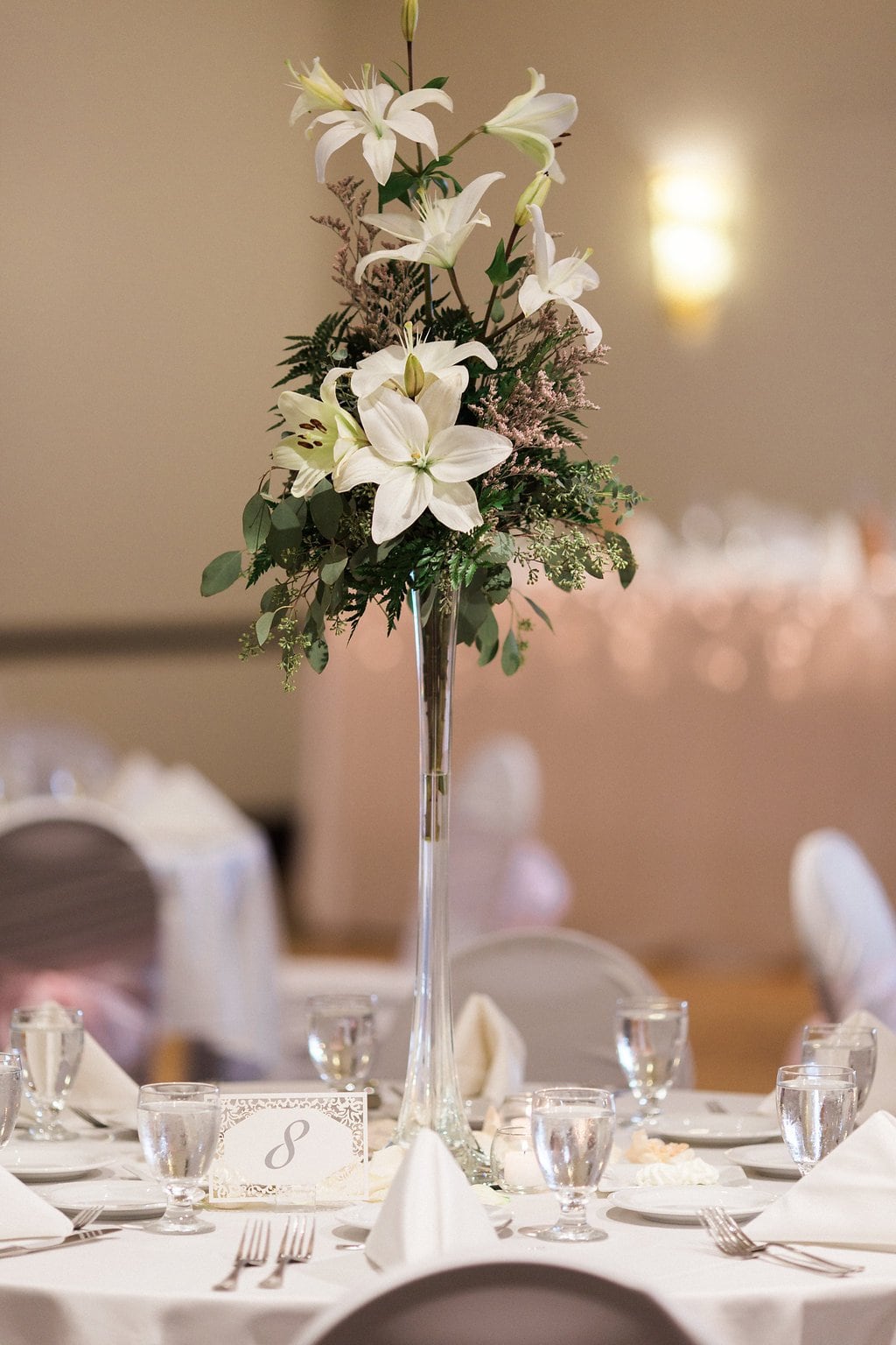 Golf Club Wedding - Lauren Renee Photography Tall centerpiece with lilies as wedding decor