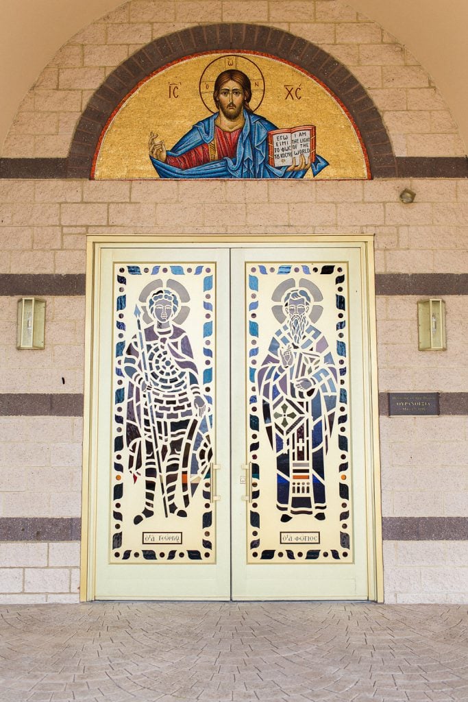 All Saints Greek Orthodox Church gold doors front entrance