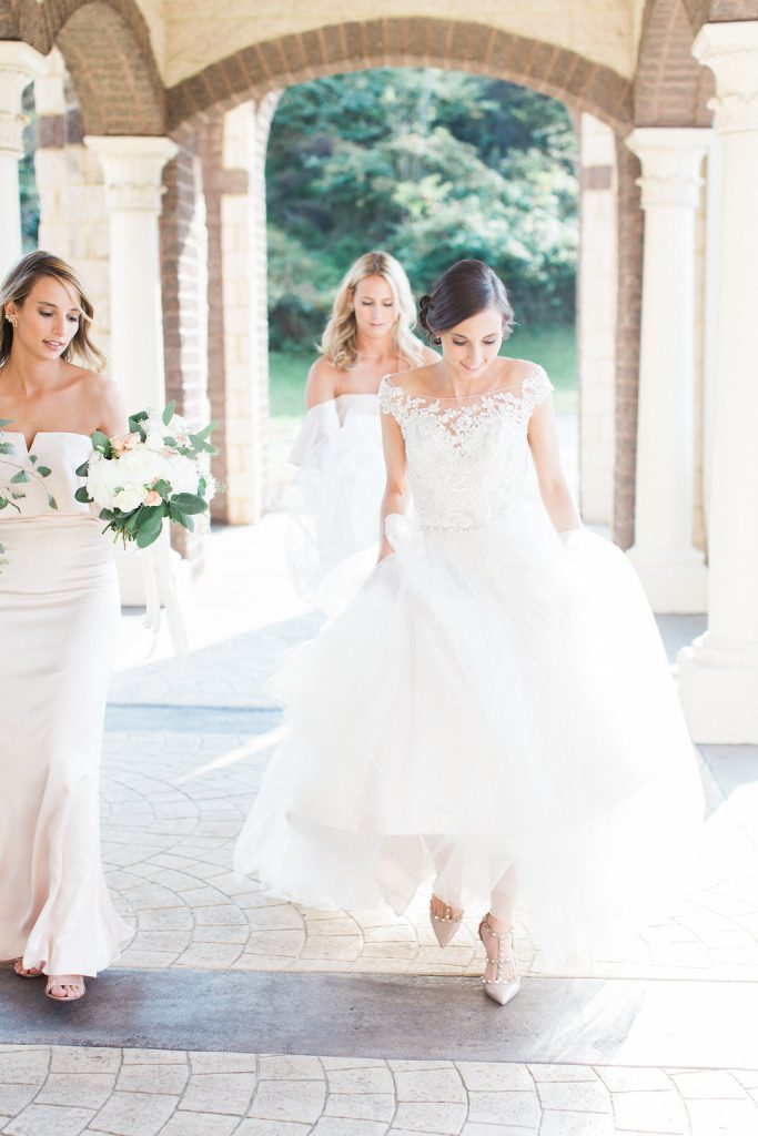 Bride walking into the church right before the wedding ceremony