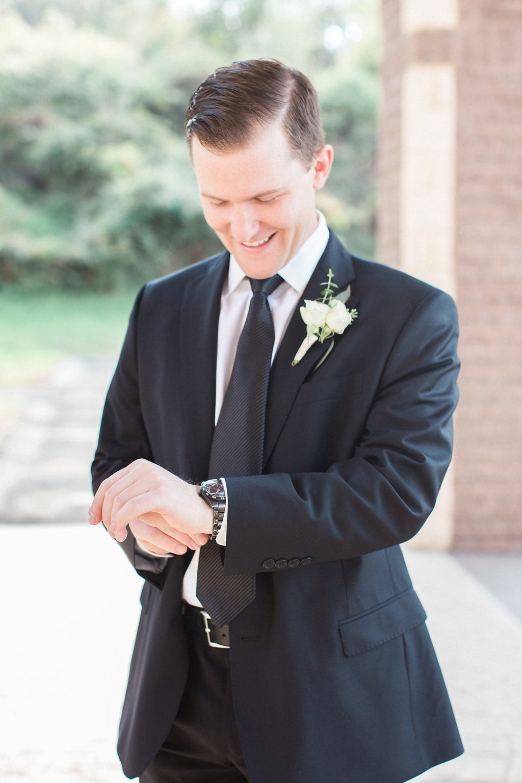 Pittsburgh Wedding - Lauren Renee Photography Groom getting ready fixing his cufflinks before the wedding