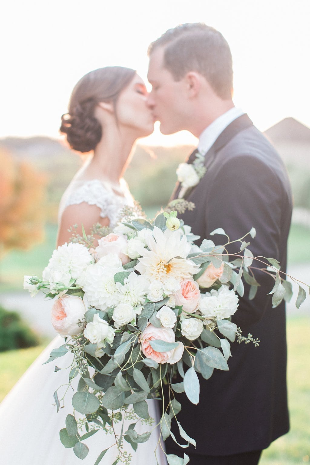 Pittsburgh Wedding - Lauren Renee Photography Gorgeous and romantic sunset portrait of the bride and groom with pink and white bouquet at the Club at Nevillewood