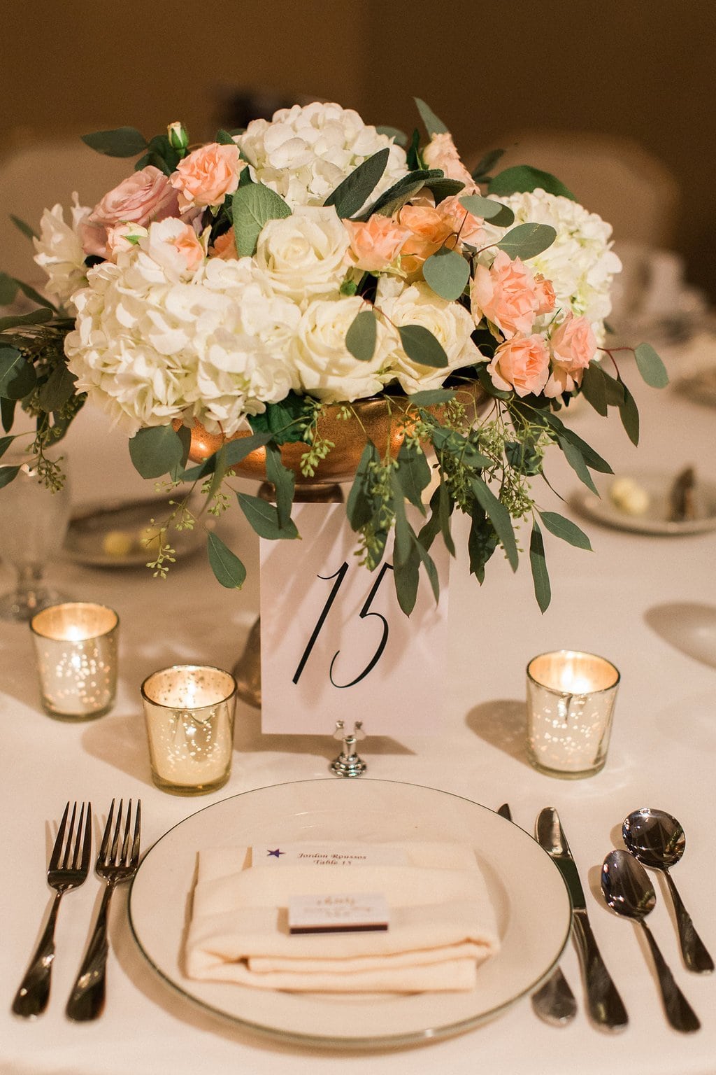 Pittsburgh Wedding - Lauren Renee Photography Table decorations and place setting details at the wedding reception with flowers candles and silverware