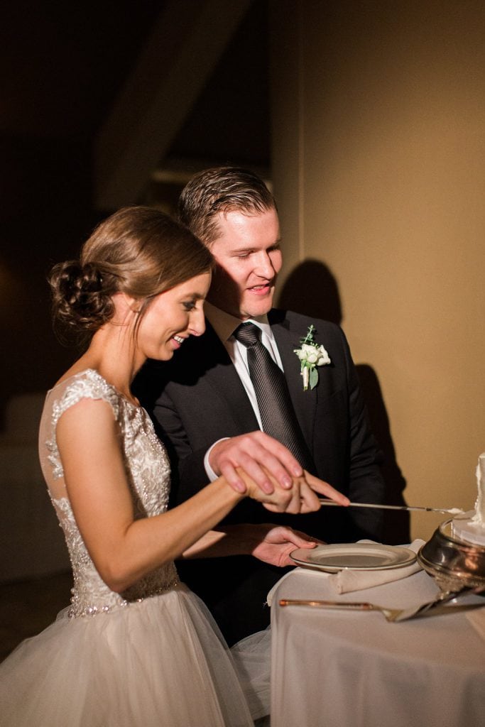 The Bride and Groom cutting their wedding cake