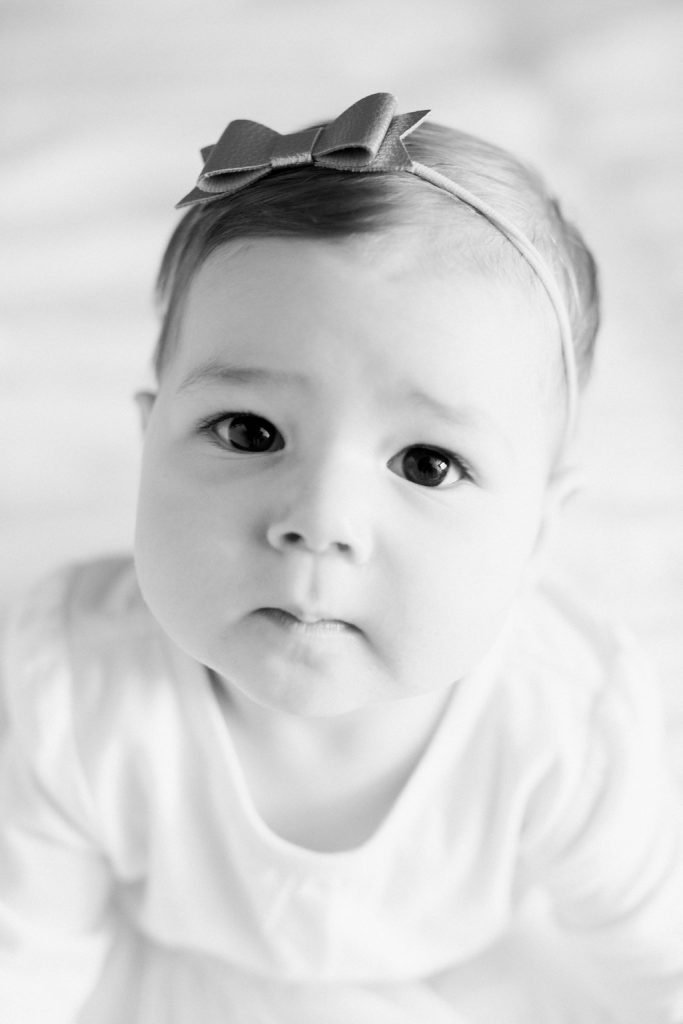 Close up black and white portrait of baby
