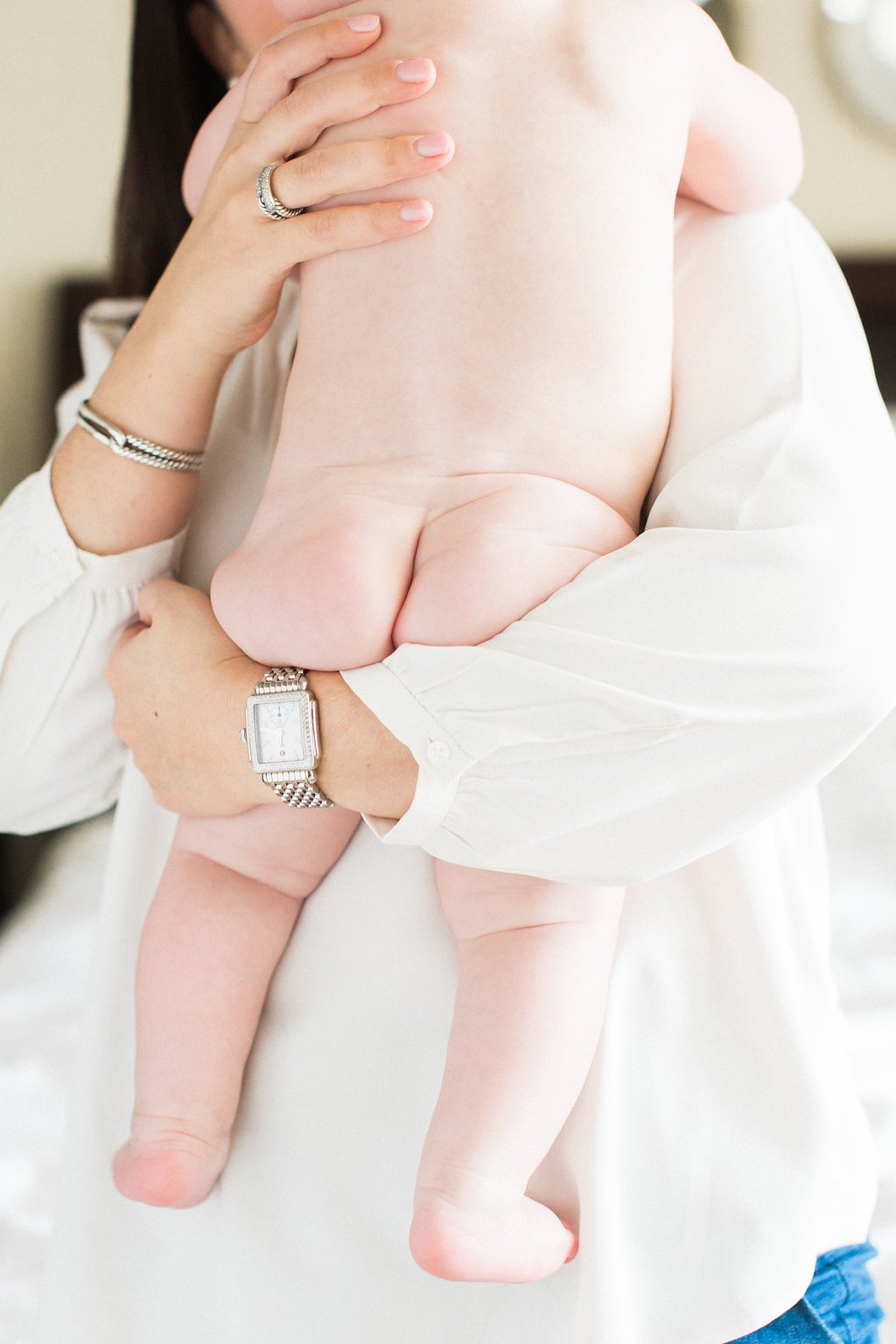 Lifestyle Photography - Lauren Renee Photography Mom holding her child in a warm embrace during