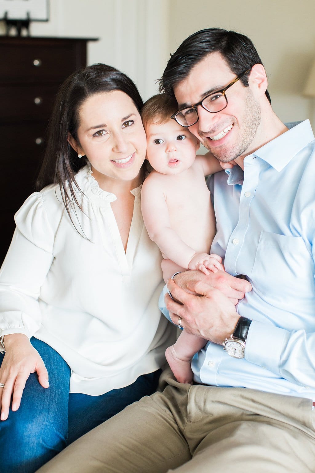 Lifestyle Photography - Lauren Renee Photography Parent's holding baby together