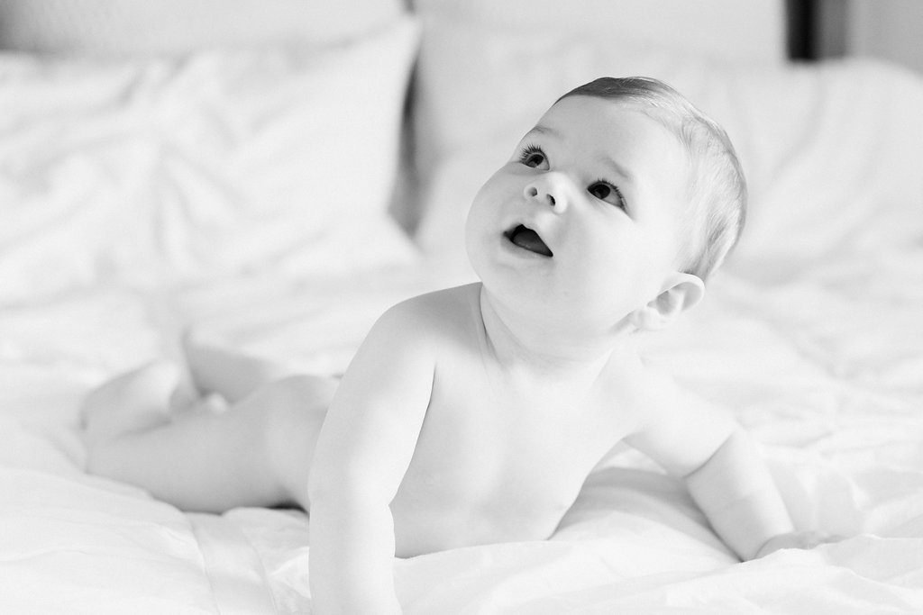 Photograph of a naked baby during family photography session
