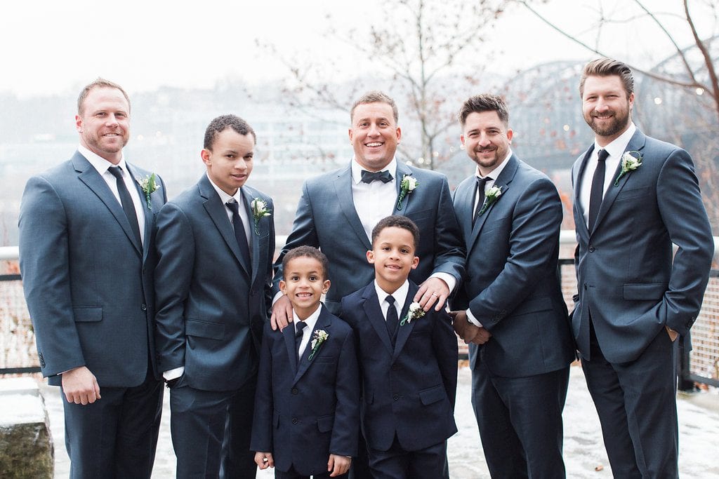 Groom with his groomsmen winter wedding photography