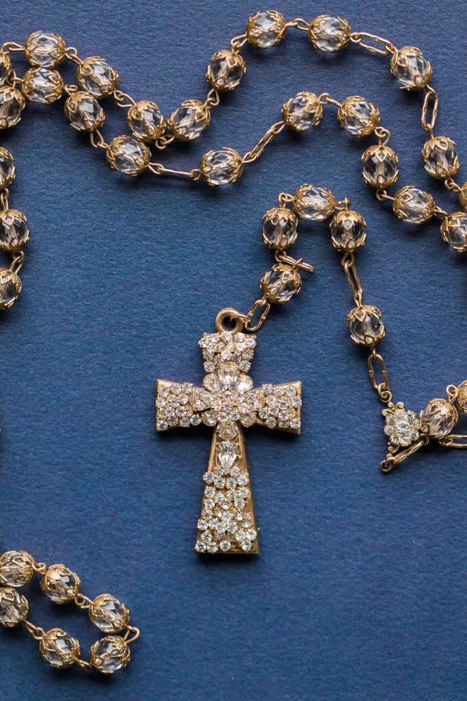 Photograph of gold and diamond rosary cross