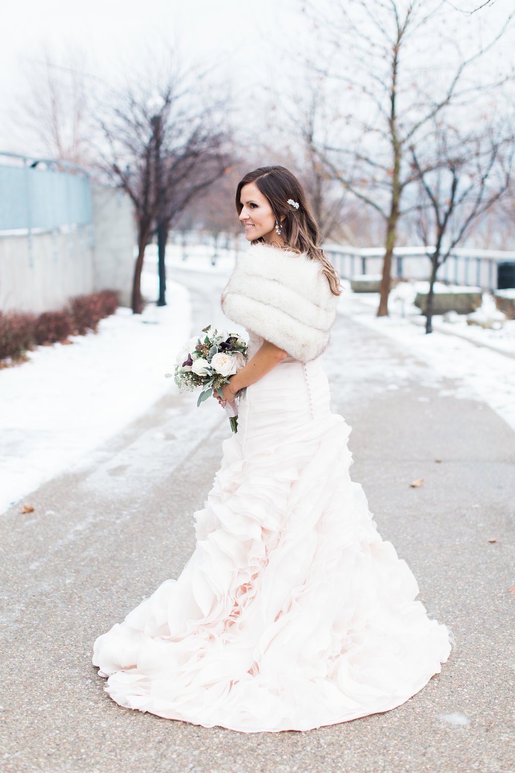 Pittsburgh Wedding Photography - Lauren Renee Photography Bride wearing blush pink wedding gown in the snow