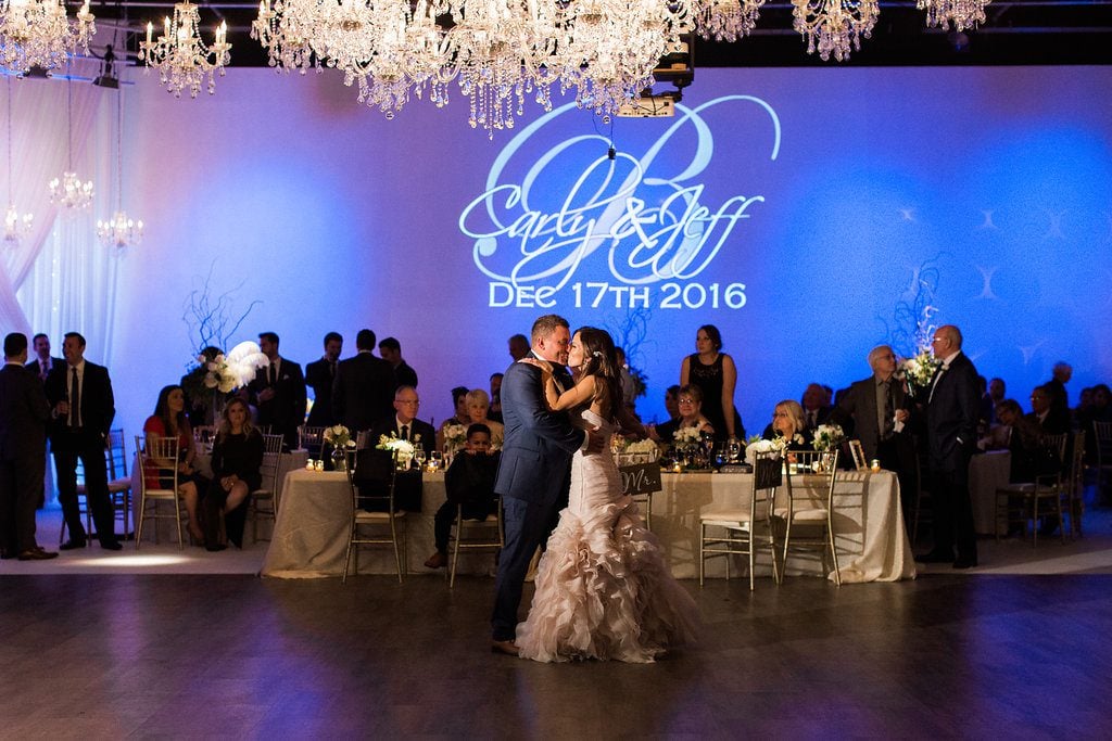 Bride and groom sharing their first dance at their wedding reception at J. Verno Studios