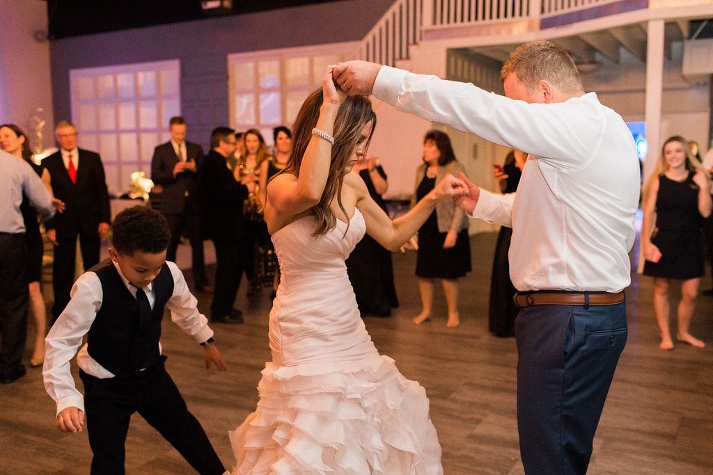 Bride and groom dancing at their wedding reception at J. Verno Studios