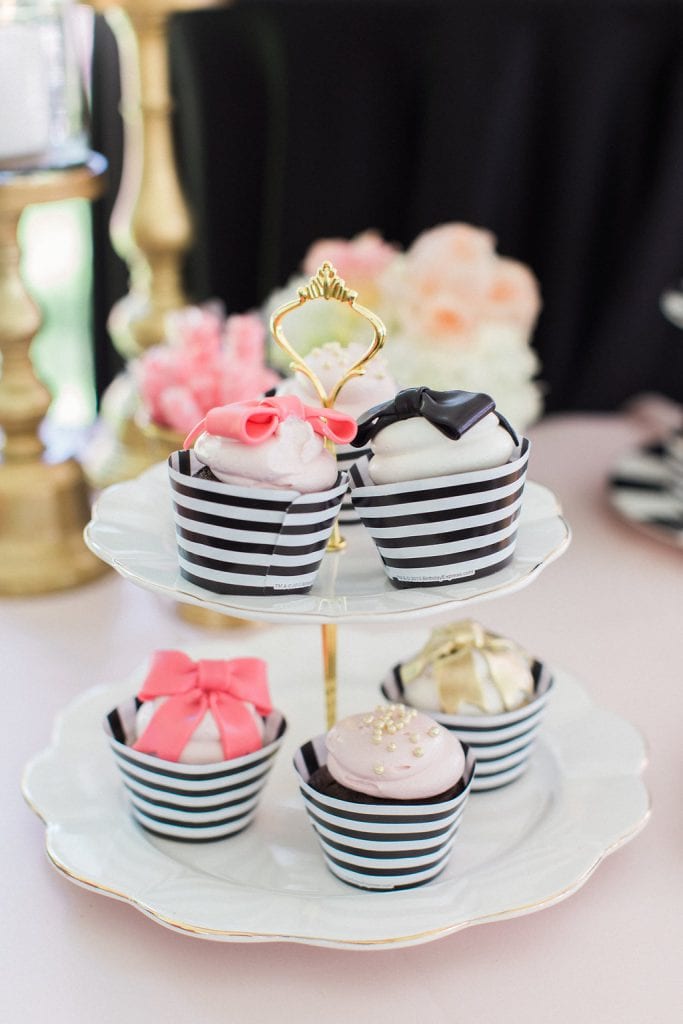 black and white cupcakes with pink bows