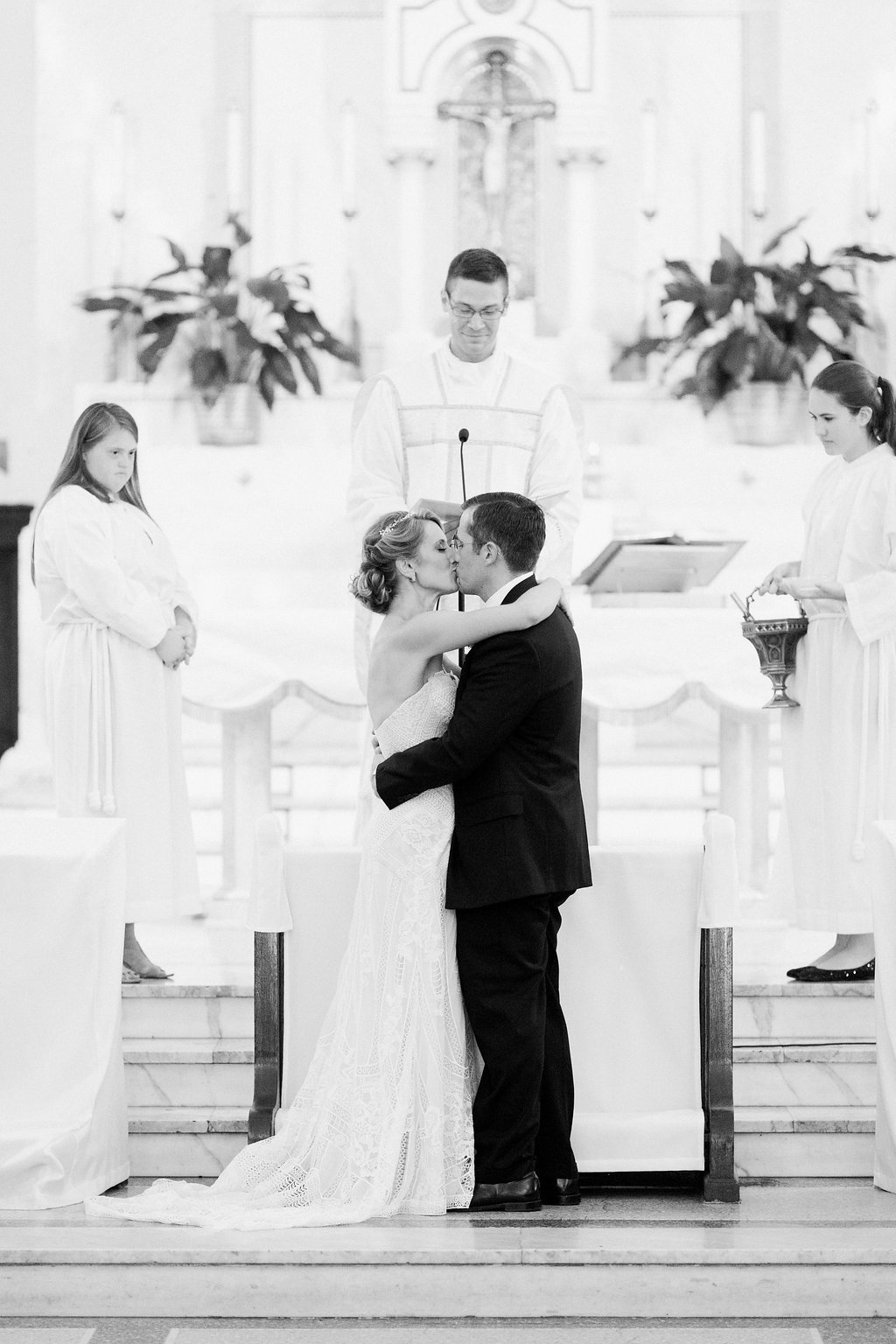 Bride is walked down the aisle by man who received her father's donated heart - Lauren Renee Photography Bride and Groom first kiss at ceremony