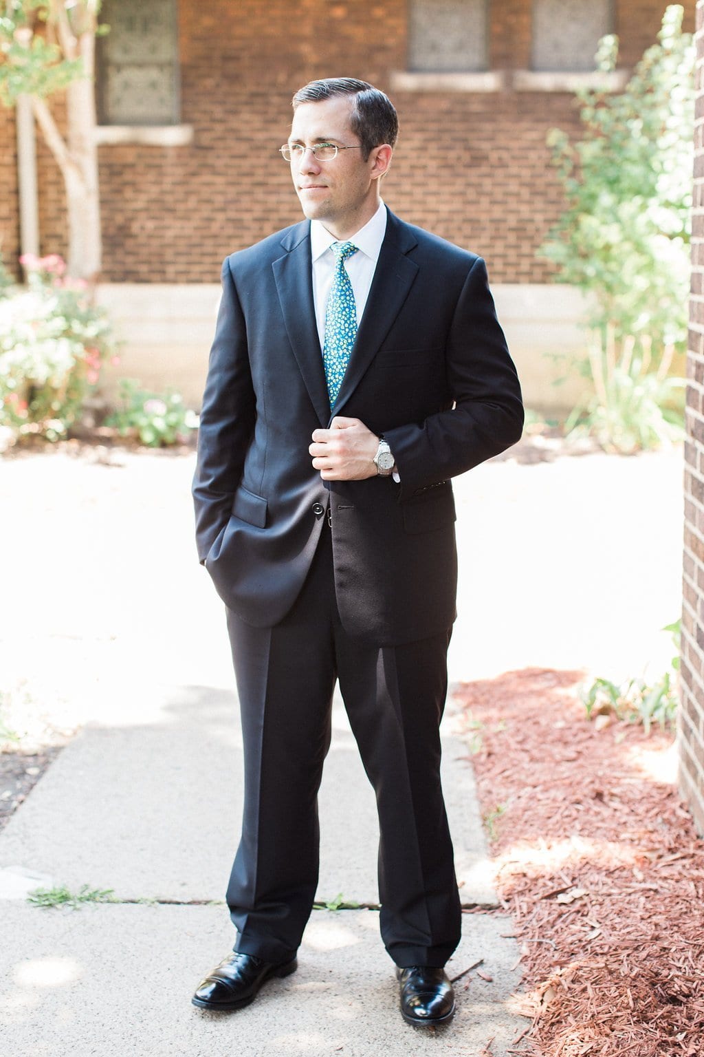 Bride is walked down the aisle by man who received her father's donated heart - Lauren Renee Designs Groom portraits outside the St. Anselm Catholic Church