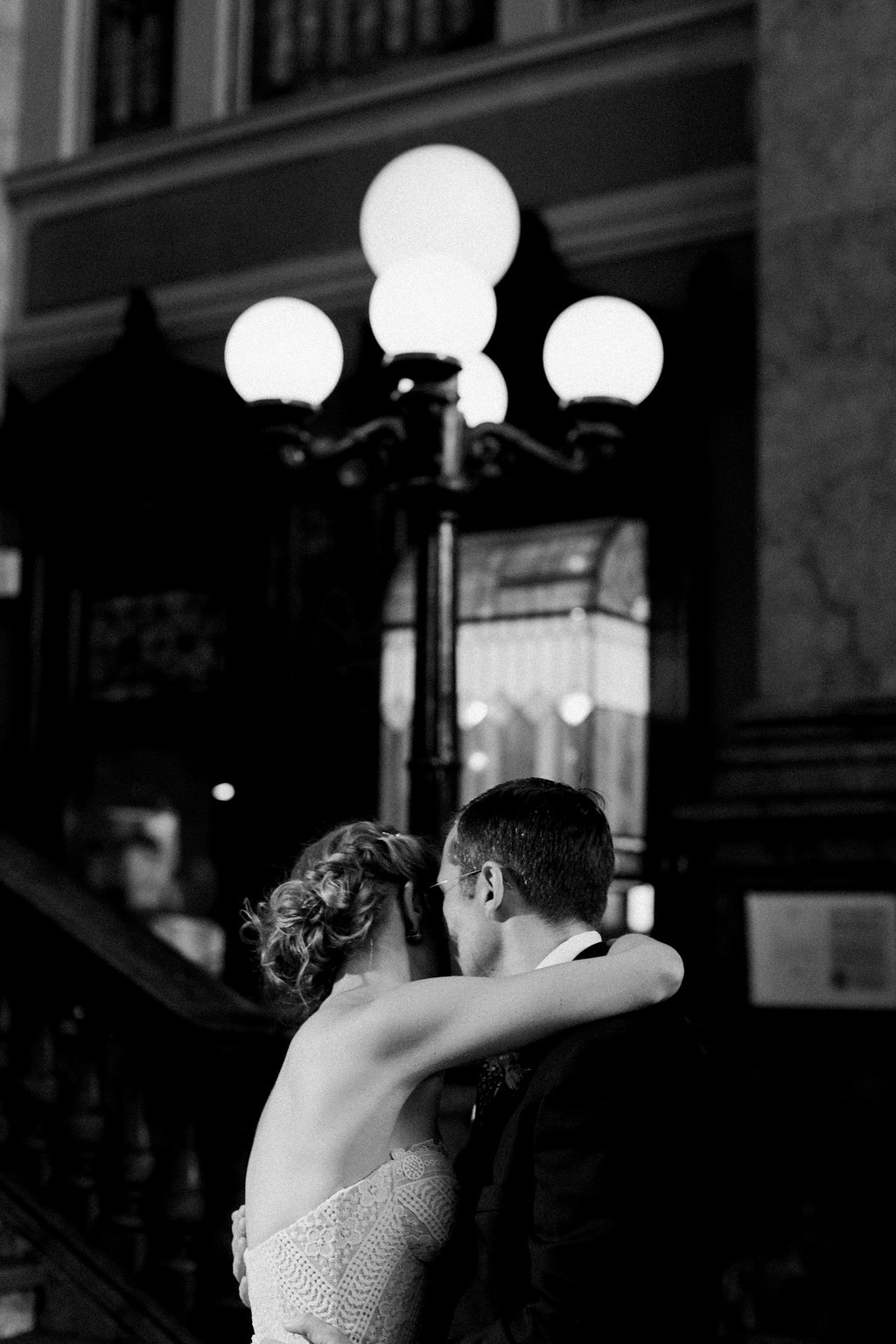 Bride is walked down the aisle by man who received her father's donated heart - Lauren Renee Photography Bride and Groom share their first dance during their wedding reception at the Grand Concourse Station Square Black and white photo