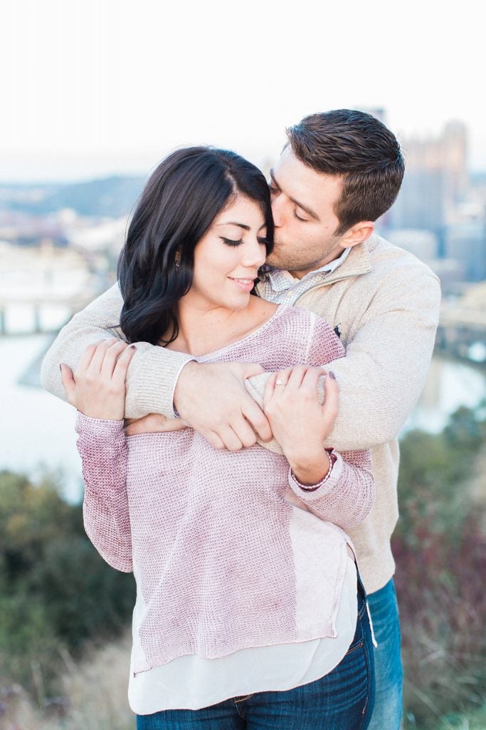 Mount Washington and South Side Engagement Couple hugging during engagement photos on top of Mount Washington