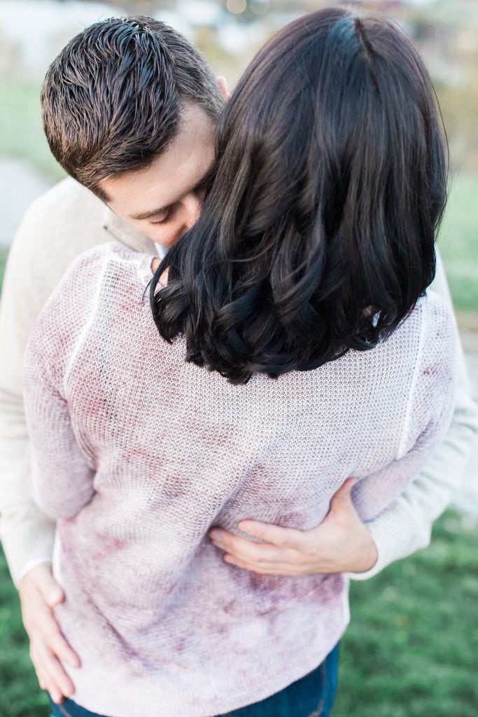 Mount Washington and South Side Engagement Couple hugging close during their engagement photography session on Mount Washington