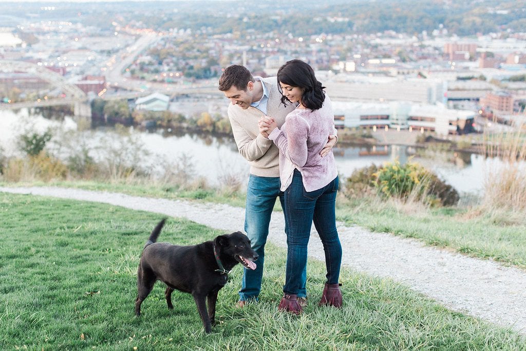 Mount Washington and South Side Engagement Engaged couple on mount Washington over looking Pittsburgh dancing with their dog